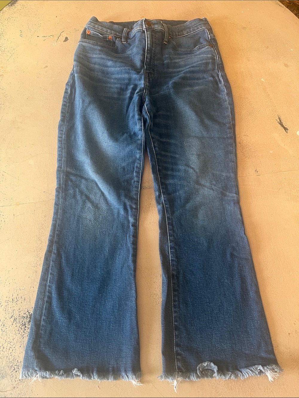 Madewell women’s size 29, medium wash blue,  Flare Jeans, frayed hem